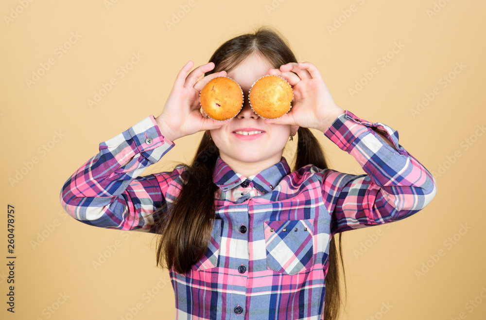 Kid in love with muffins. Obsessed with homemade food. Diet healthy nutrition and calorie. Yummy muffins. Girl cute child eating muffins or cupcake. Sweet dessert. Culinary recipe. Tasty snack Kid in love with muffins. Obsessed with homemade food. Diet healthy nutrition and calorie. Yummy muffins. Girl cute child eating muffins or cupcake. Sweet dessert. Culinary recipe. Tasty snack