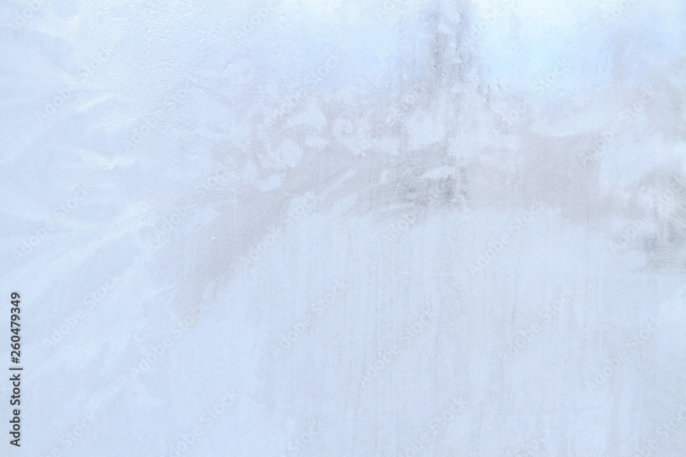 Frosty patterns on a frozen ice box in the early morning Frosty patterns on a frozen ice box in the early morning