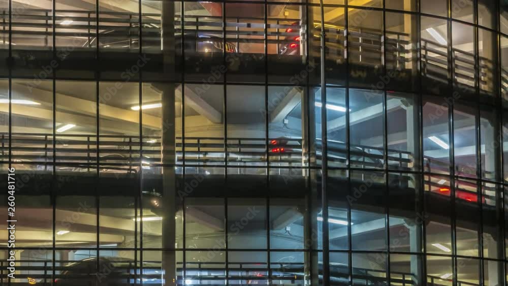 Departure of cars from the multi-storey Parking of the stadium after a football game Departure of cars from the multi-storey Parking of the stadium after a football game