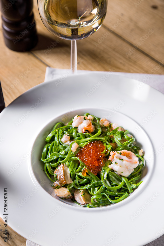Pasta with shrimp and salmon caviar. Pasta with shrimp and salmon caviar.