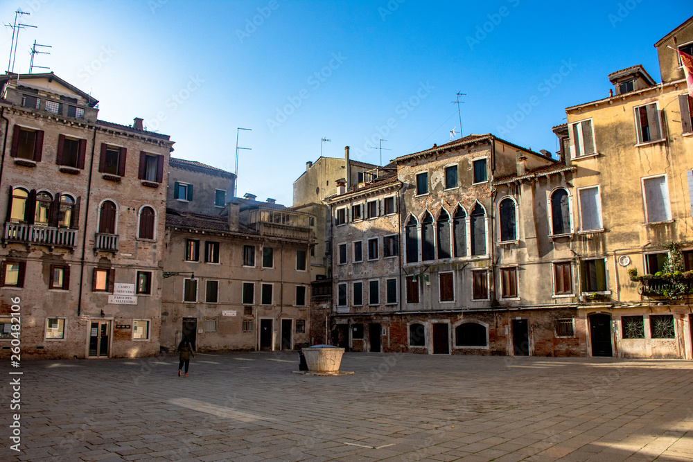 Italy, Venice, view of a typical square with a well.