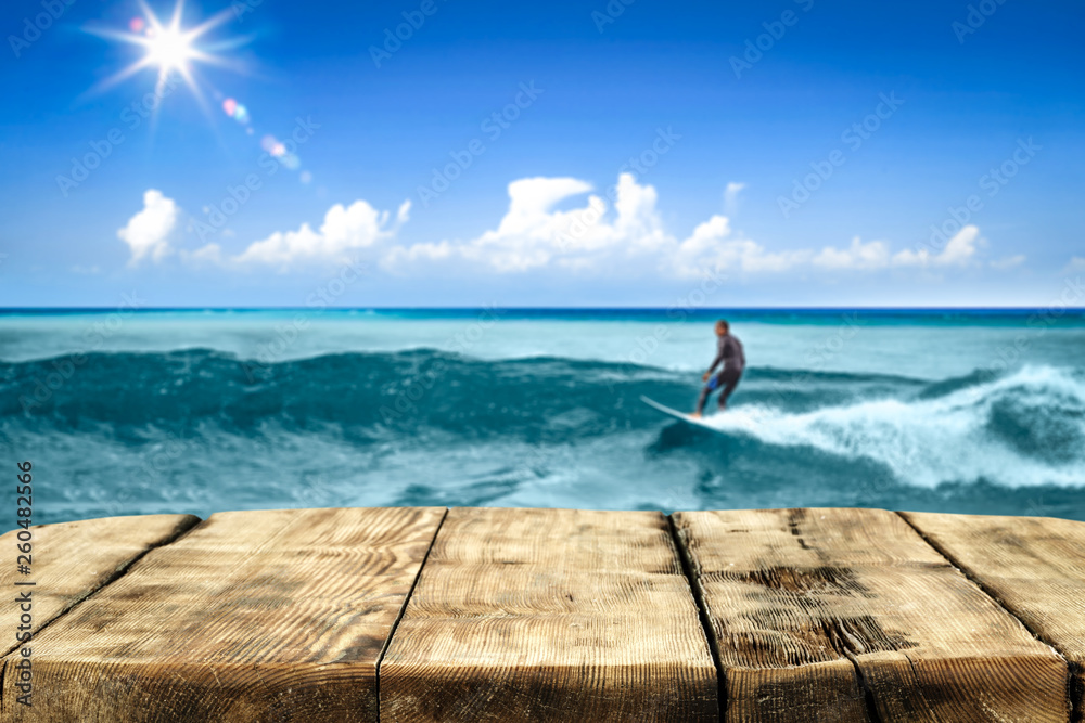 Summer table background of free space and surfer on waves. 