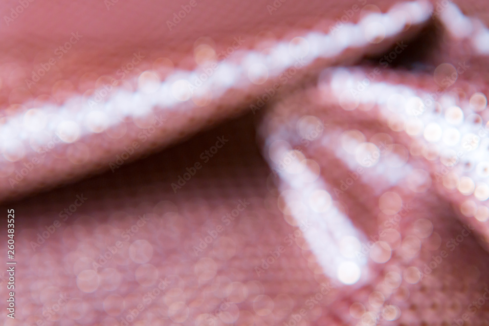 texture of the fabric, side, background of fabric in the highlight. golden color texture of the fabric, side, background of fabric in the highlight. golden color