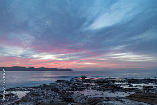 High Cloud Pink Dawn Seascape from Rock Platform