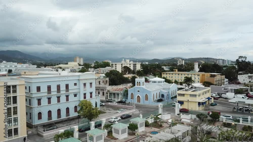 AERIAL: lowering over the Parque Urbano Dora Colon in Ponce, Puerto Rico on a cloudy day. AERIAL: lowering over the Parque Urbano Dora Colon in Ponce, Puerto Rico on a cloudy day.