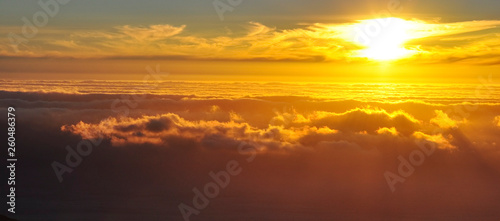 Fototapeta Naklejka Na Ścianę i Meble -  Golden sunset above clouds, mountain view, Table Mountain, South Africa