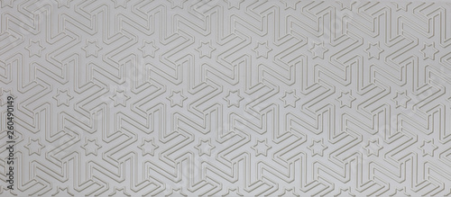tile with abstract geometric white pattern