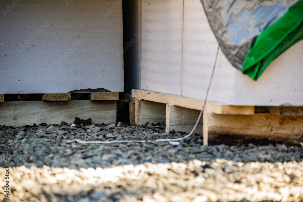 Obraz premium Building materials, aerated concrete blocks, foam blocks and bricks for construction of buildings. Modern, light and warm. The acquisition of new parts for the Assembly of the house. White and light g