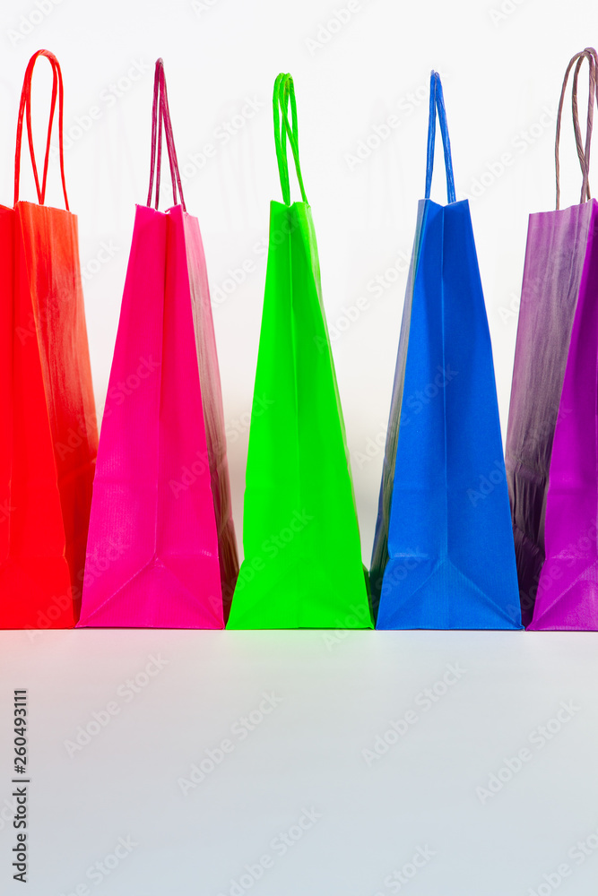 Set of colorful empty shopping bags isolated on the white background.