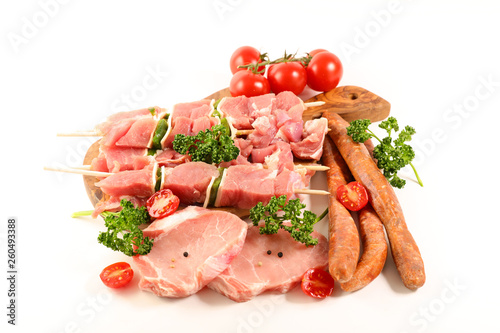 assorted raw meats isolated on white background