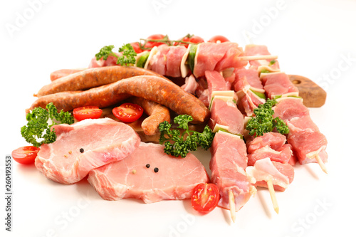 assorted raw meats isolated on white background