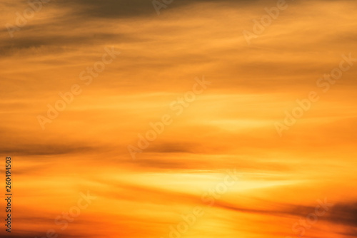 Orange sky background at evening with clouds. Sunset © BigNazik