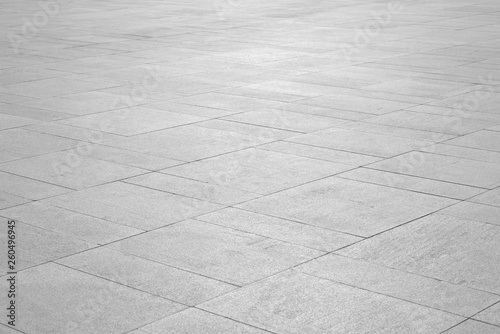 Paving stones background. Road texture black and white. Stone flooring. Stone covering on the square.