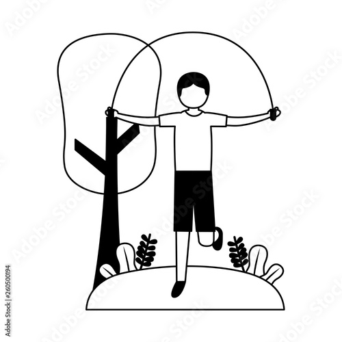 sporty man jumping rope