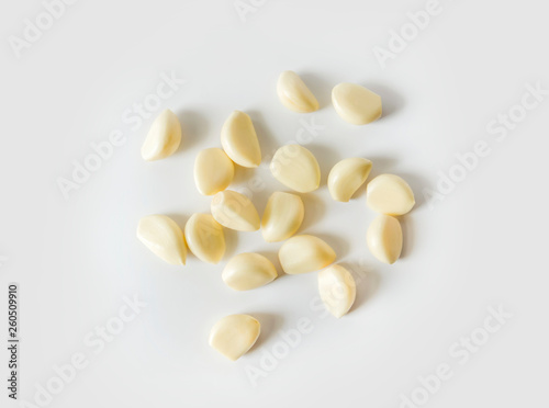 Garlic cloves on the white background