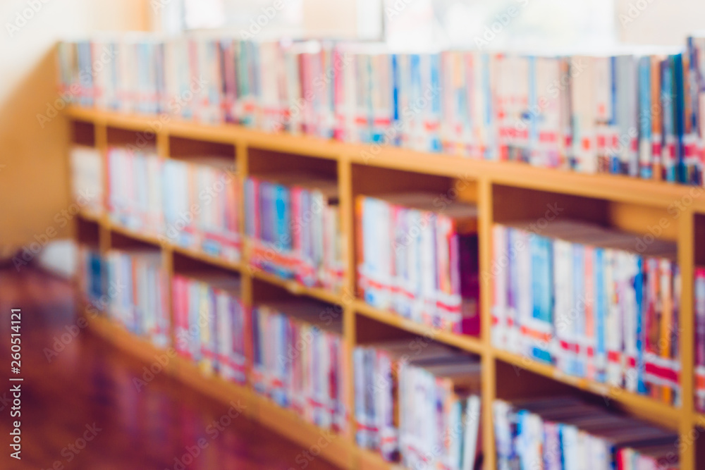 Blurred old books on bookshelf in library. Education conecpt. Blurred old books on bookshelf in library. Education conecpt.