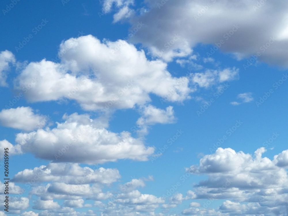 Blue sky with white clouds. Beautiful sky background. Clear day and good weather. Blue sky with white clouds. Beautiful sky background. Clear day and good weather.