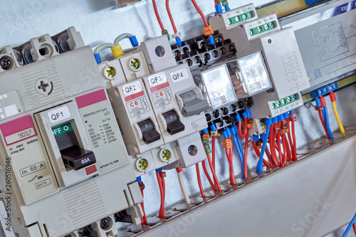 Industrial and modular circuit breakers, intermediate relays, device and surge protector in electrical Cabinet. Professional Assembly of electrical cabinets according to the scheme or project.