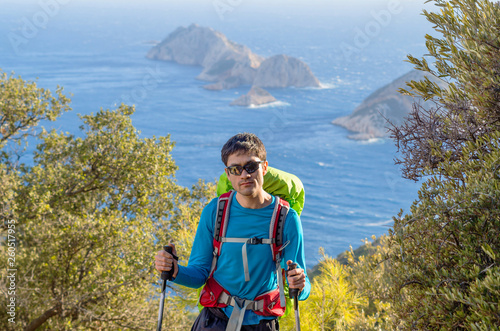 A handsome man climbing up a mountain in Turkey. Mountaineering as a perfect sports for health and happiness.