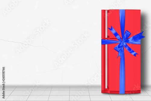 Home appliance -  Red refrigerator in front of white wall gift tied blue bow photo