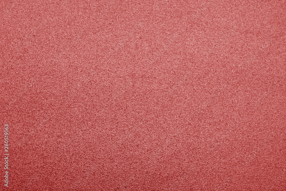 Fototapeta premium Plastic glittering texture in red color.