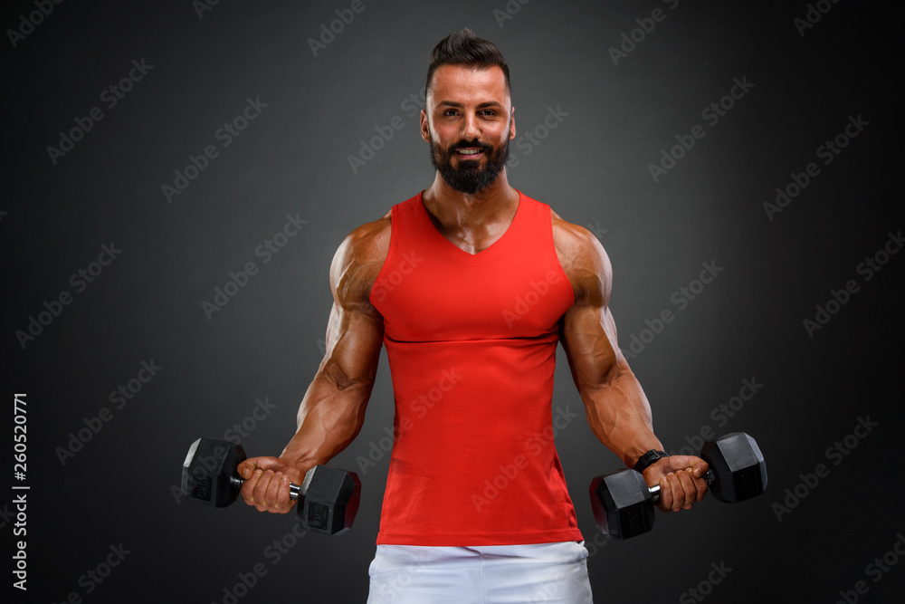 Handsome Muscular Men exercise With Dumbbells