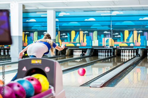 Wallpaper Mural Rear view of a young woman bowling Torontodigital.ca