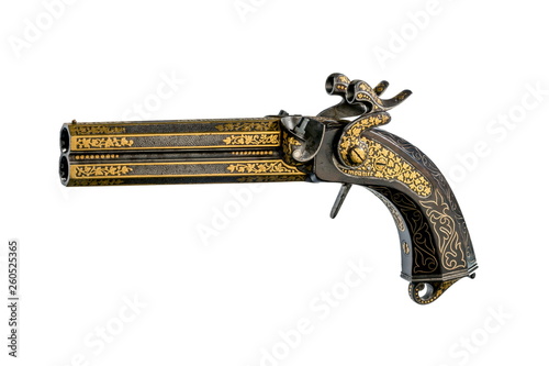Vintage pistol with engraving and carving