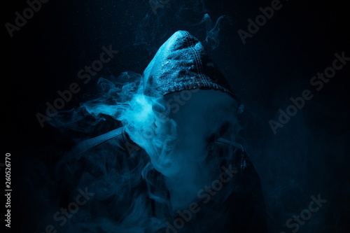 Fotografie Black hood and smoke