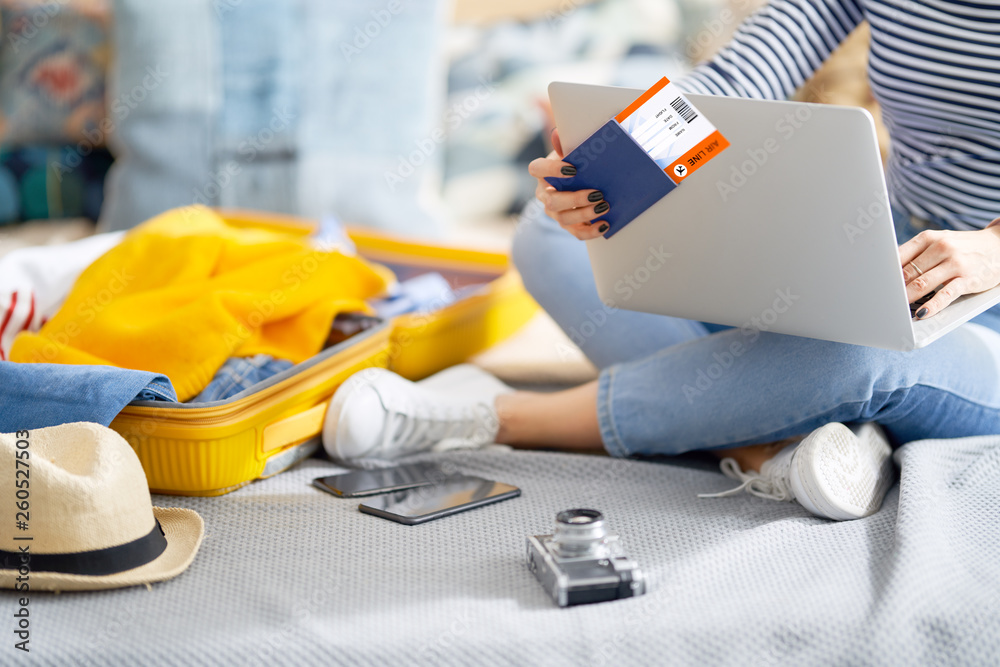 Fototapeta premium woman preparing for the journey