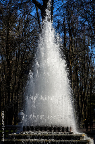 Four layers fountain with shining light in spring