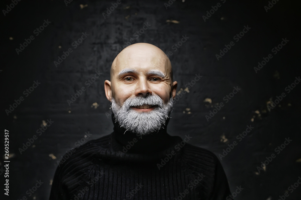 Santa Claus hipster / portrait of a fashionable modern Santa, young man with a gray beard, Christmas winter portrait Santa Claus hipster / portrait of a fashionable modern Santa, young man with a gray beard, Christmas winter portrait
