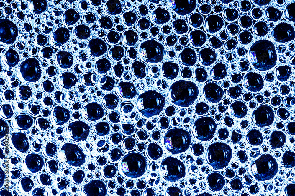 Soap suds bubble pattern. Water foam on black frying pan texture. Stock  Photo | Adobe Stock