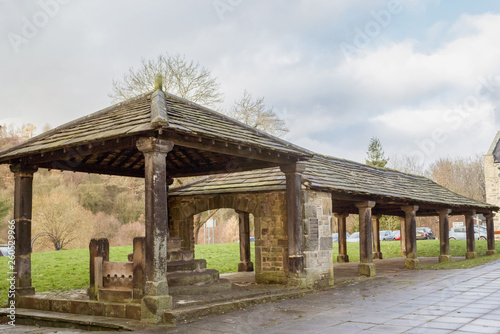 Bingley's ancient market hall complete with stocks ready for dodgy traders photo