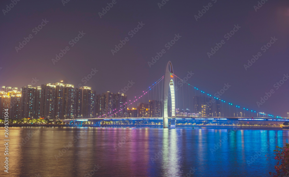 Fototapeta premium the Pearl River with Liede Bridge illuminated at night in Guangzhou, China