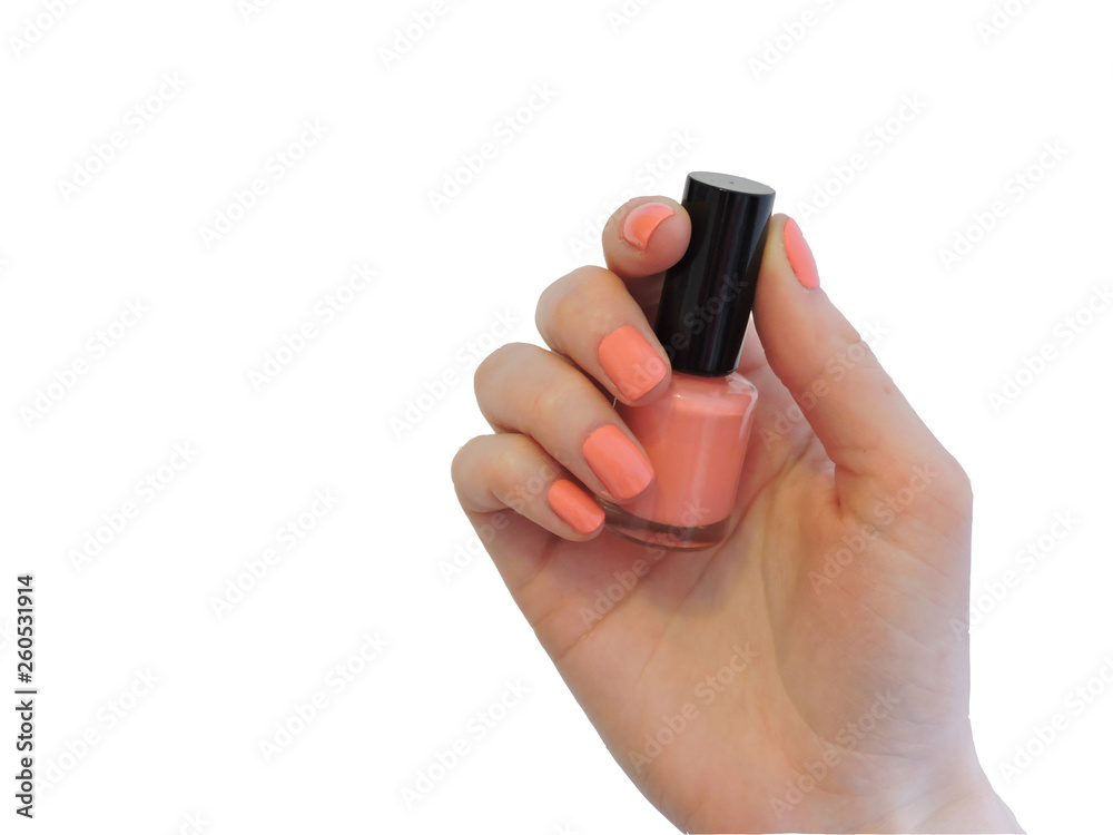 Fototapeta premium Orange nail polish bottle on white background.Cosmetics and beauty concept. Top view, flat lay. Free Copy space. Beauty blogger concept. Nail polish.