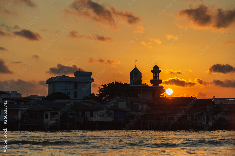 Beautiful sunrise view from old  community along the Chao Phraya River