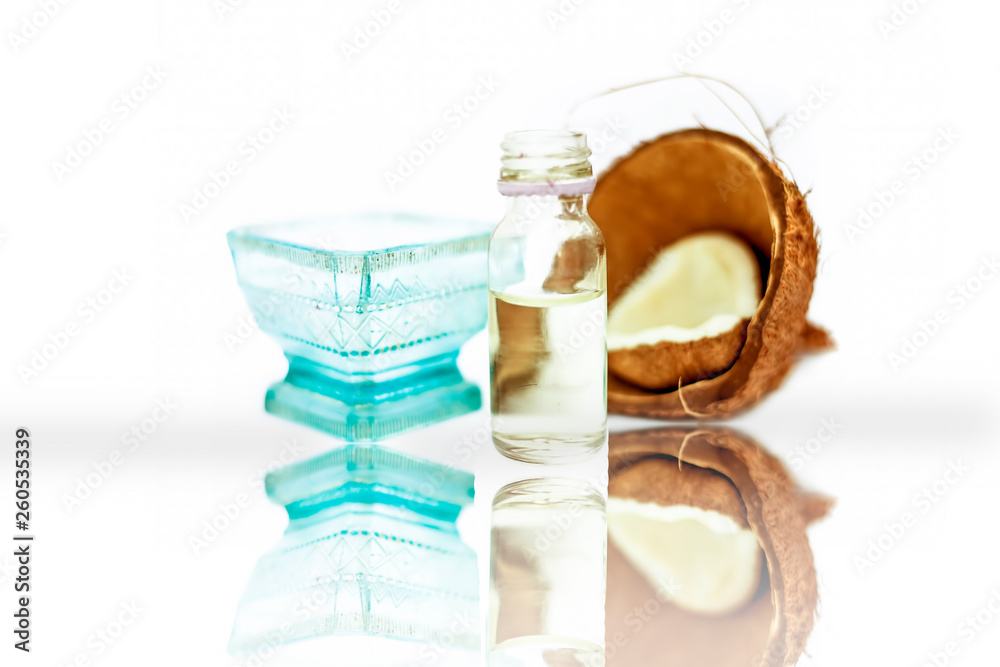 Best home remedy to reduce premature greys isolated on white i.e. Coconut oil well mixed with lemon juice in a glass bowl with entire raw ingredients. Best home remedy to reduce premature greys isolated on white i.e. Coconut oil well mixed with lemon juice in a glass bowl with entire raw ingredients.
