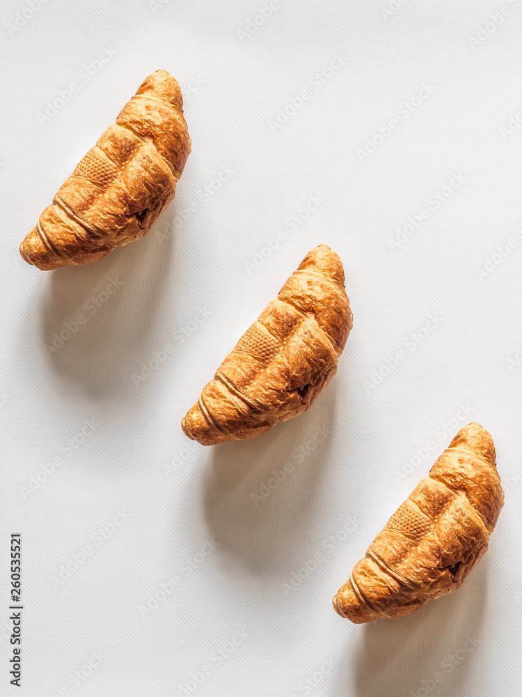 Croissants on a white background top view Croissants on a white background top view