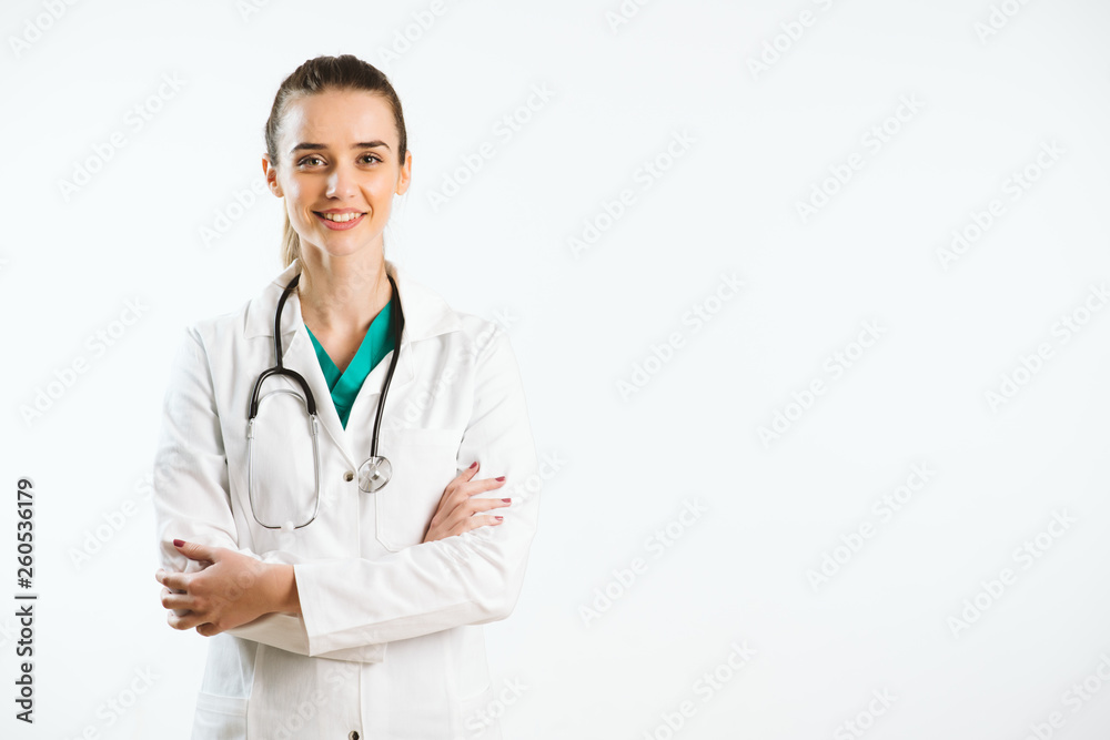 Young nurse in a scrub uniform wearing a stethoscope.