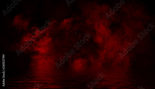 Red smoke with reflection in water. Mistery fog texture overlays background