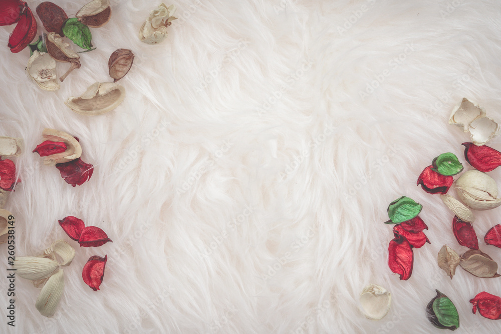 aroma therapy and spa object in spring season with red and green dry tropical leaf decorate on white wool or fur background with copyspace aroma therapy and spa object in spring season with red and green dry tropical leaf decorate on white wool or fur background with copyspace
