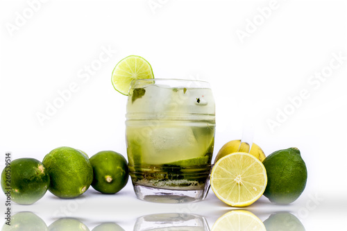 Popular Summer Drink isolated on white i.e. Virgin mint mojito with fresh lemons also.