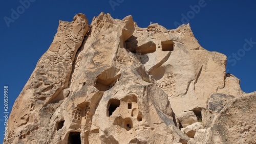 fabulos natural volcanick eroded formation with created cave houses at sunny day. Goreme open park,Cappadocia,turkey
