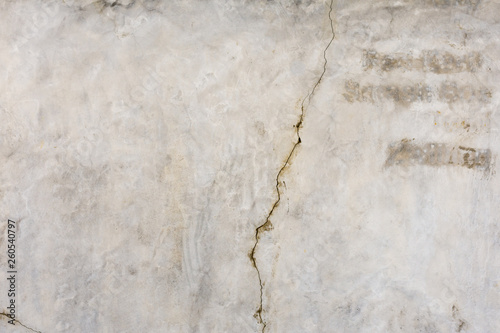 Cracked concrete vintage wall background. Closeup Texture abstract old wall background.