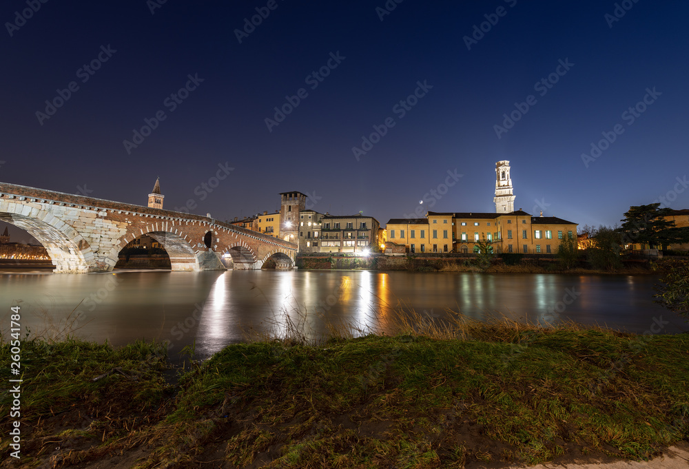 Ponte Pietra and Adige River at night - Verona Italy