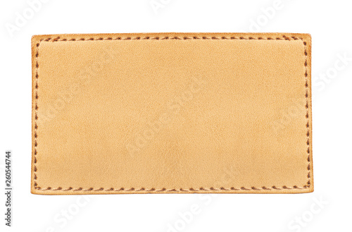 Brown stitched leather seam frame label tag isolated on white. Empty copy space fashion background.