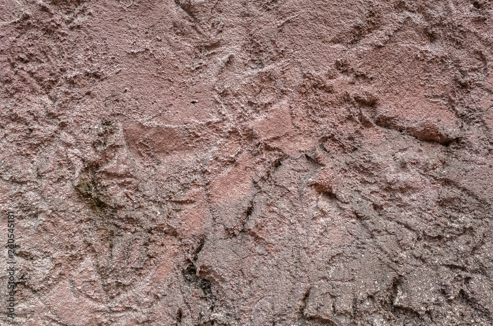 rough stone wall in brown color rough stone wall in brown color