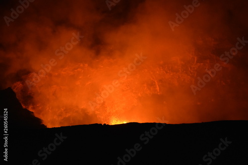 Kilauea Volcanoe Big Island Hawaii Lava spewing up from the crater in the night looks like fire being thrown into the night