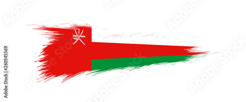 Flag of Oman in grunge brush stroke.
